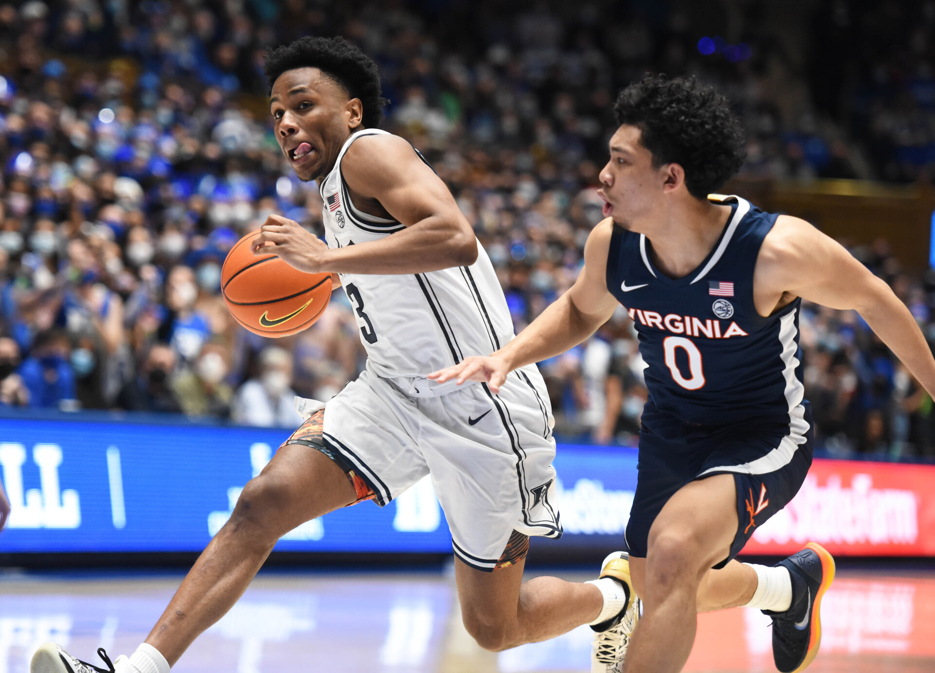 Duke Blue Devils guard Jeremy Roach (3) drives to the basket past Virginia Cavaliers guard Kihei Clark (0) during the second half at Cameron Indoor Stadium. The Cavaliers won 69-68.
