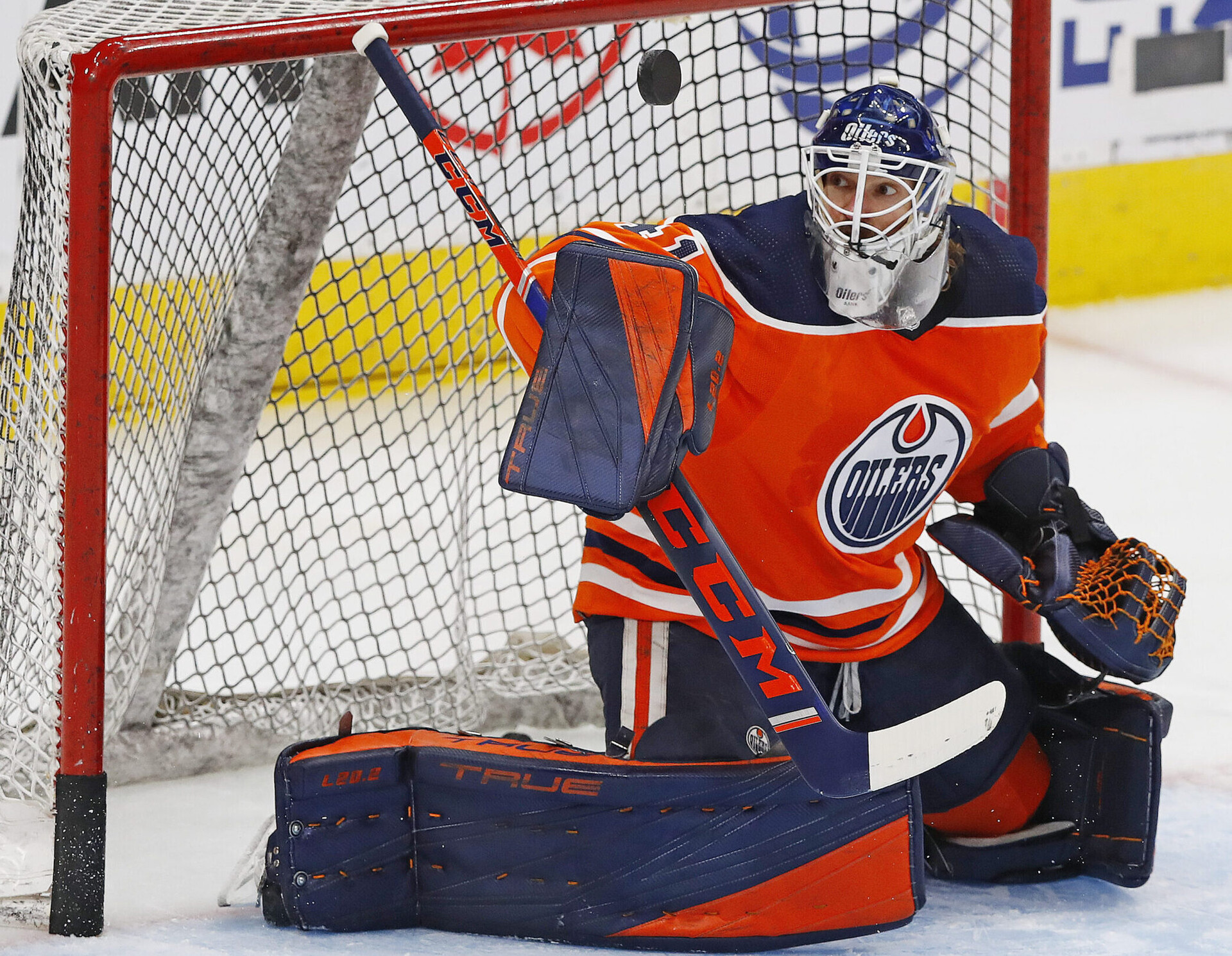 Edmonton Oilers goaltender Mike Smith makes a save during warmups before facing the Chicago Blackhawks