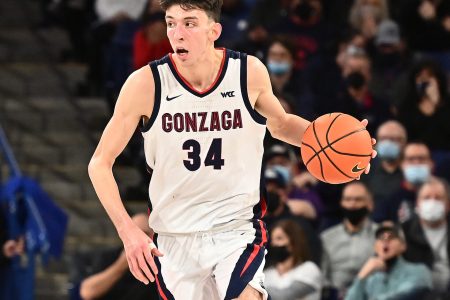Gonzaga Bulldogs center Chet Holmgren brings the ball down court against the Pacific Tigers