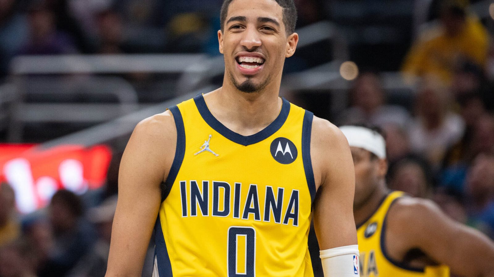 Indiana Pacers guard Tyrese Haliburton smiles during a break in the action against the Cleveland Cavaliers