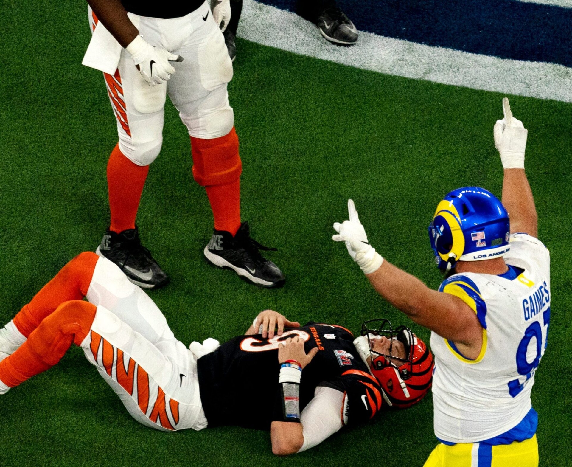 Cincinnati Bengals quarterback Joe Burrow (9) lays on the ground after a turnover on downs with less than a minute to play in the 4th quarter during Super Bowl 56, Thursday, Feb. 3, 2022, at SoFi Stadium in Inglewood, Calif. Los Angeles Rams defeated Cincinnati Bengals 23-20. Nfl Super Bowl 56 Los Angeles Rams Vs Cincinnati Bengals Feb 13 2022 Albert Cesare 2683