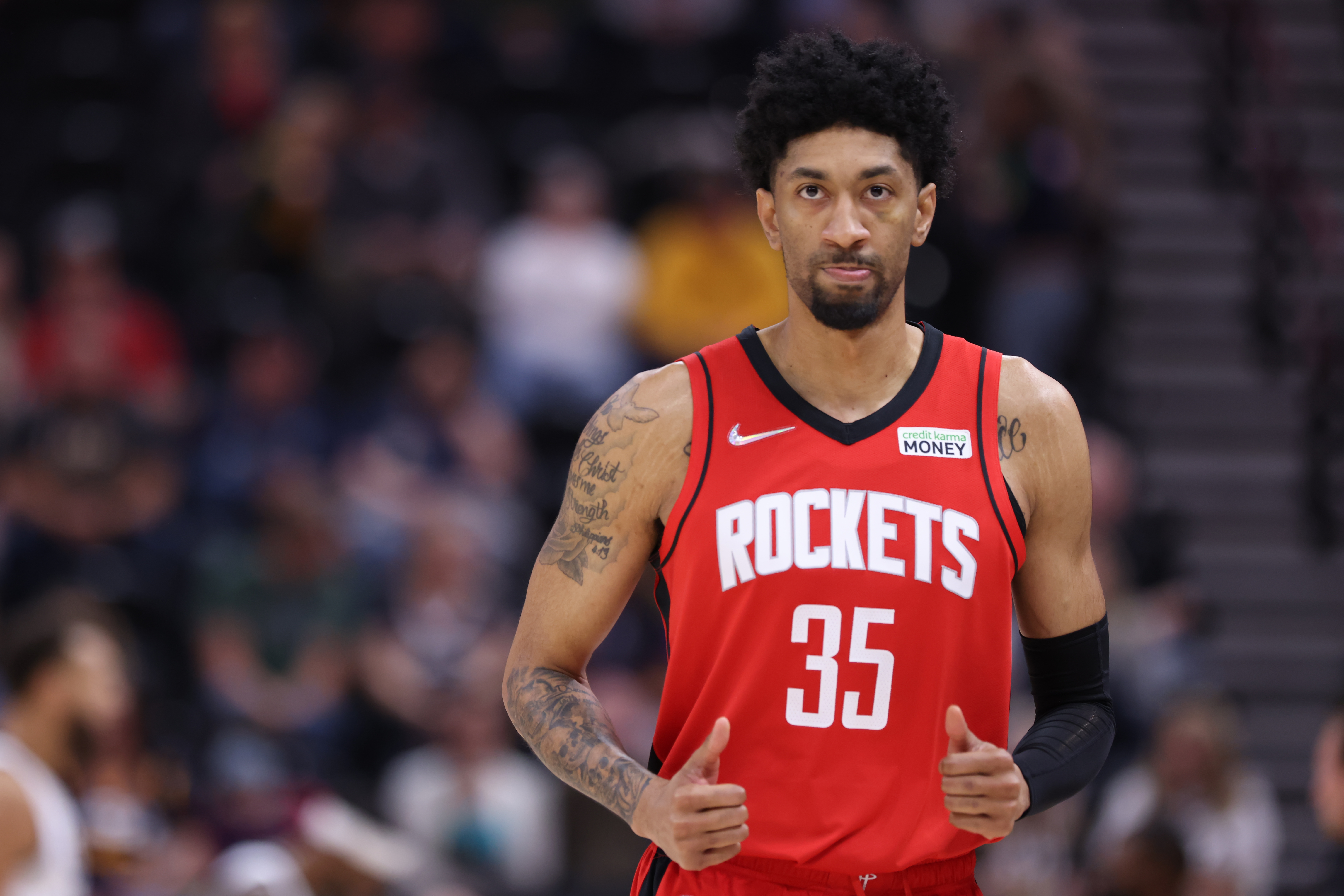 Houston Rockets center Christian Wood reacts to a play in the first quarter against the Utah Jazz with two thumbs up
