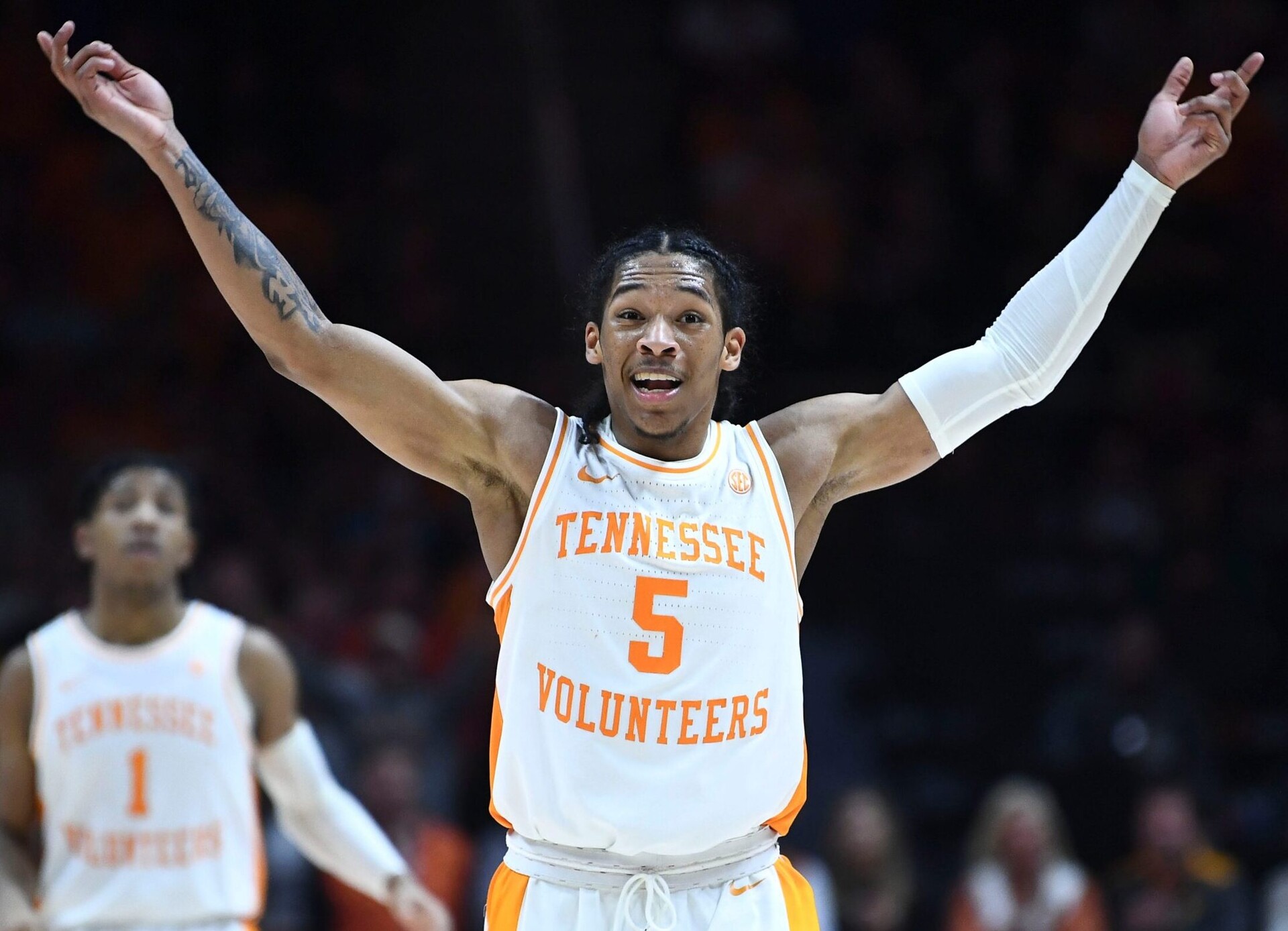 Tennessee guard Zakai Zeigler encourages the crowd to cheer during an SEC basketball game against the Kentucky Wildcats