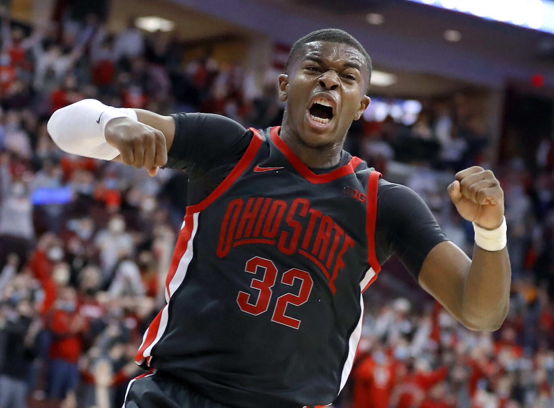 Ohio State Buckeyes forward E.J. Liddell reacts with joy during overtime in a Big Ten basketball game against the Indiana Hoosiers