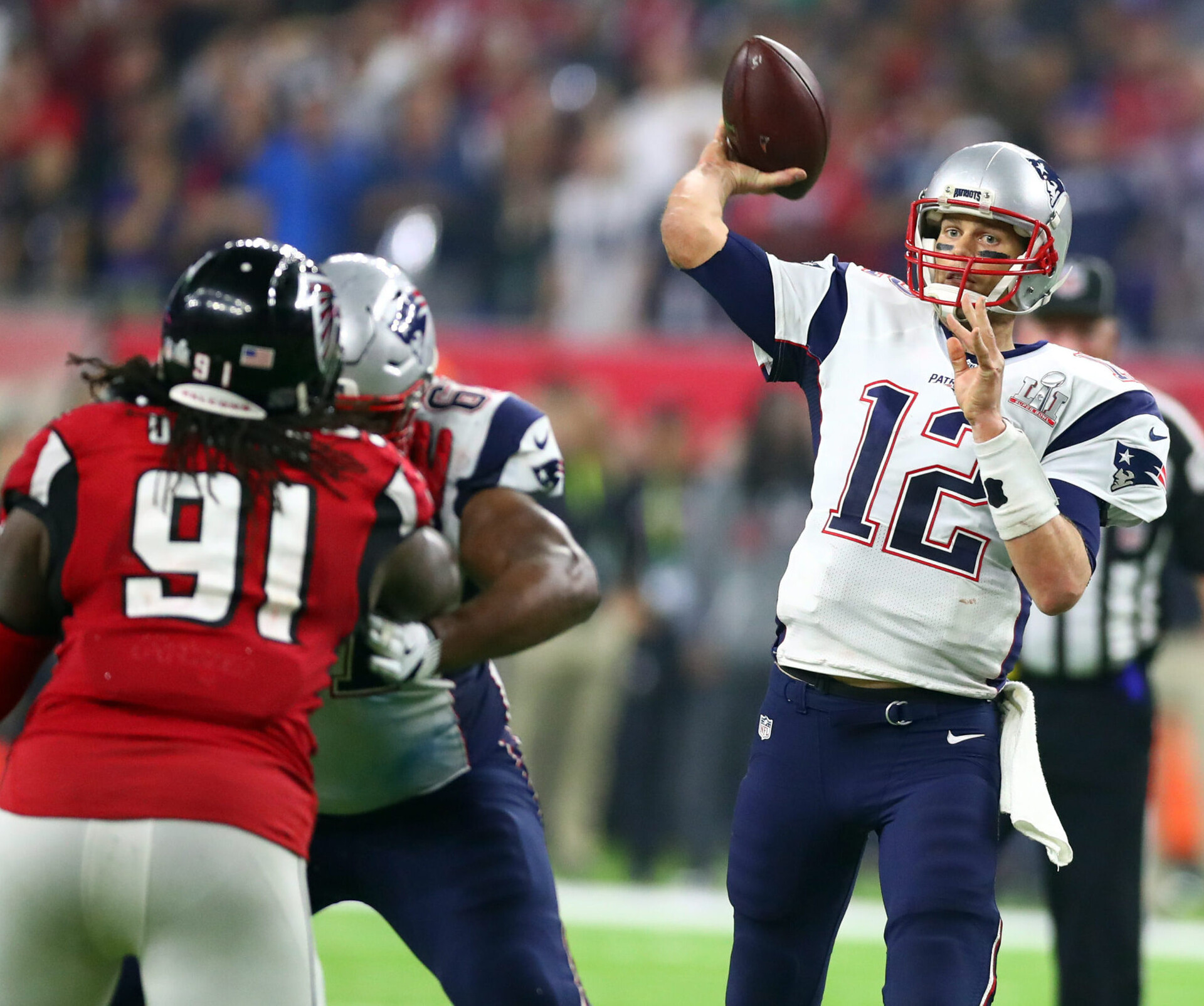 New England Patriots quarterback Tom Brady throws a pass against the Atlanta Falcons in overtime during Super Bowl LI