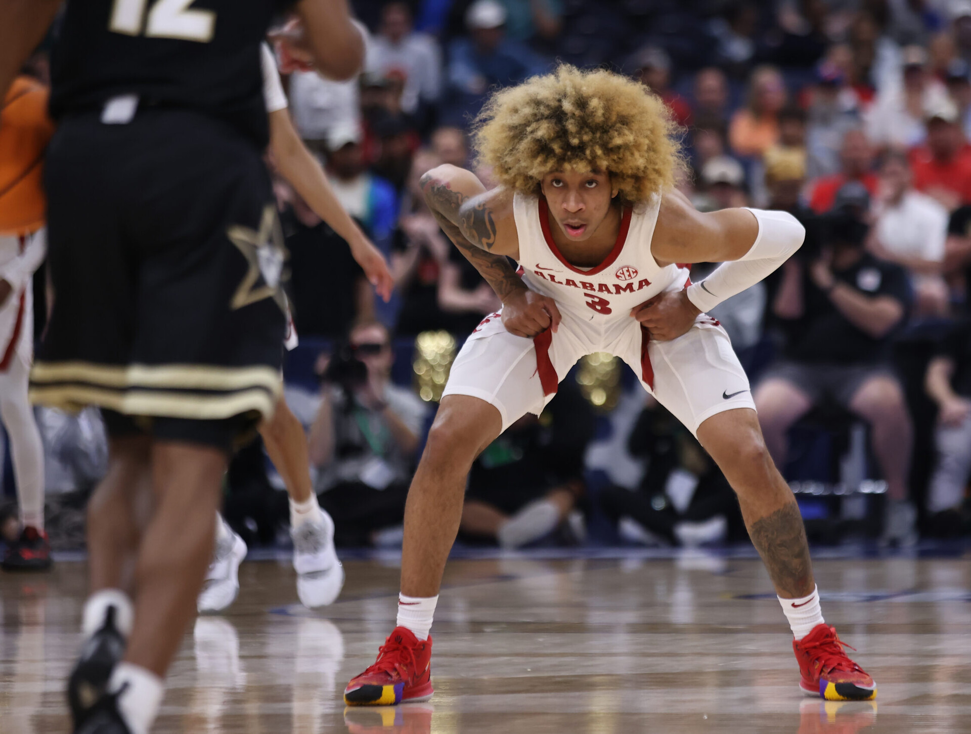 Alabama Crimson Tide guard JD Davison (3) gets lows as he defends late in the game during the SEC Tournament between the Vanderbilt Commodores and the Alabama Crimson Tide on Thursday, March 10, 2022, at the Amalie Arena in Tampa, FL