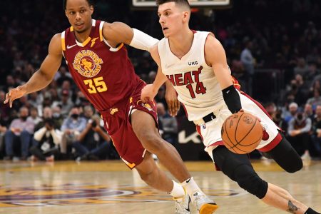 Tyler Herro #14 of the Miami Heat drives to the basket around Isaac Okoro #35 of the Cleveland Cavaliers during the second quarter at Rocket Mortgage Fieldhouse on December 13, 2021 in Cleveland, Ohio.