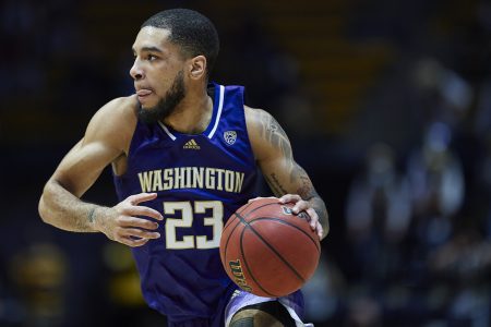 Washington Huskies guard Terrell Brown Jr. (23) carries the ball during the NCAA basketball game between the California Golden Bears and the Washington Huskies on February 3, 2022 at Haas Pavilion in Berkeley, CA.