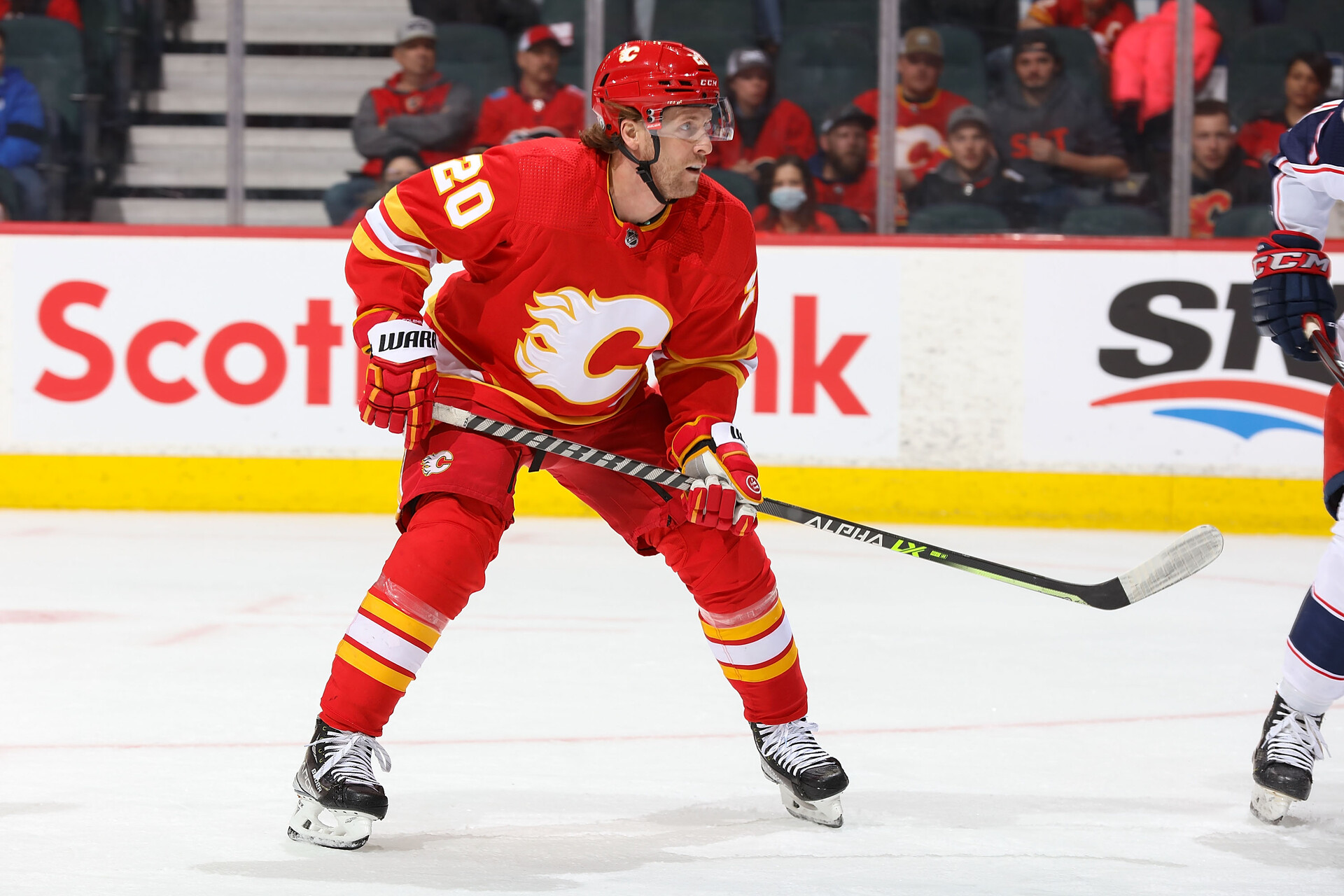Blake Coleman #20 of the Calgary Flames awaits a pass against the Columbus Blue Jackets at Scotiabank Saddledome on February 15, 2022 in Calgary, Alberta, Canada.