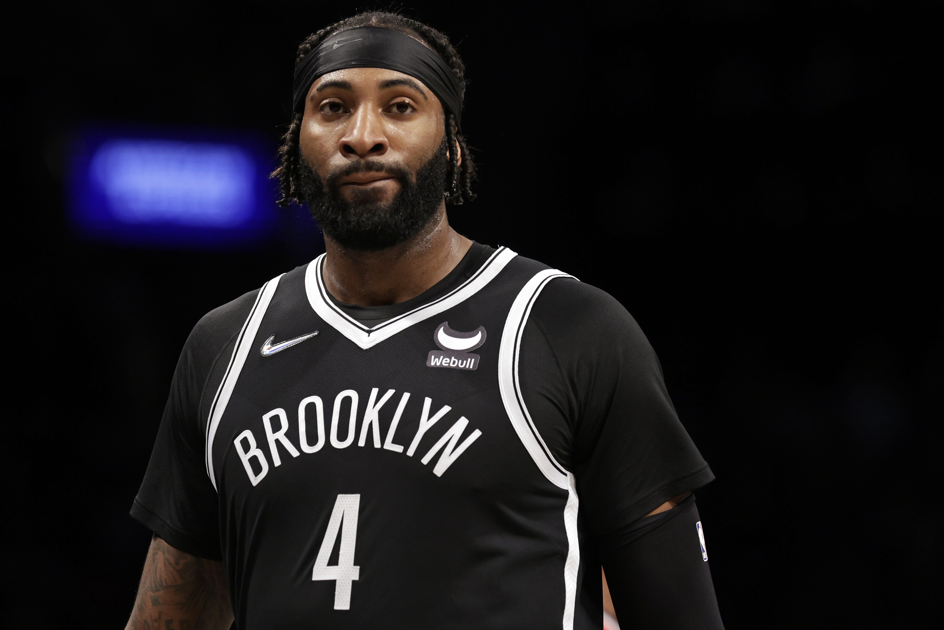 Andre Drummond #4 of the Brooklyn Nets walks off the court during the second half against the Washington Wizards at Barclays Center on February 17, 2022 in New York City. Wizards won 117-103.