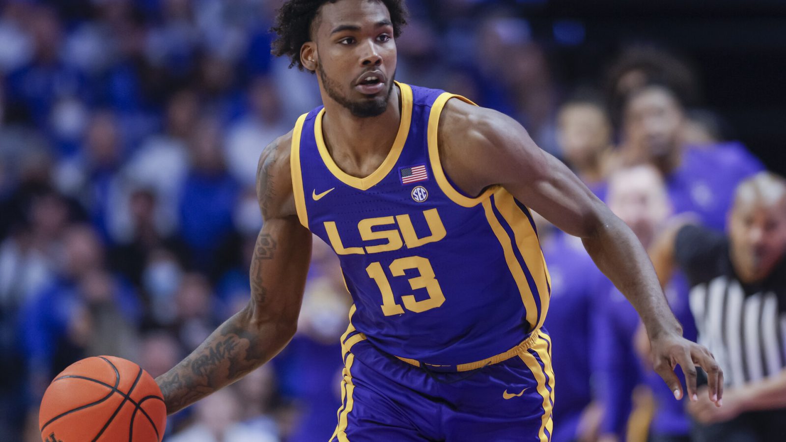 Tari Eason #13 of the LSU Tigers brings the ball up court during the game against the Kentucky Wildcats at Rupp Arena on February 23, 2022 in Lexington, Kentucky.