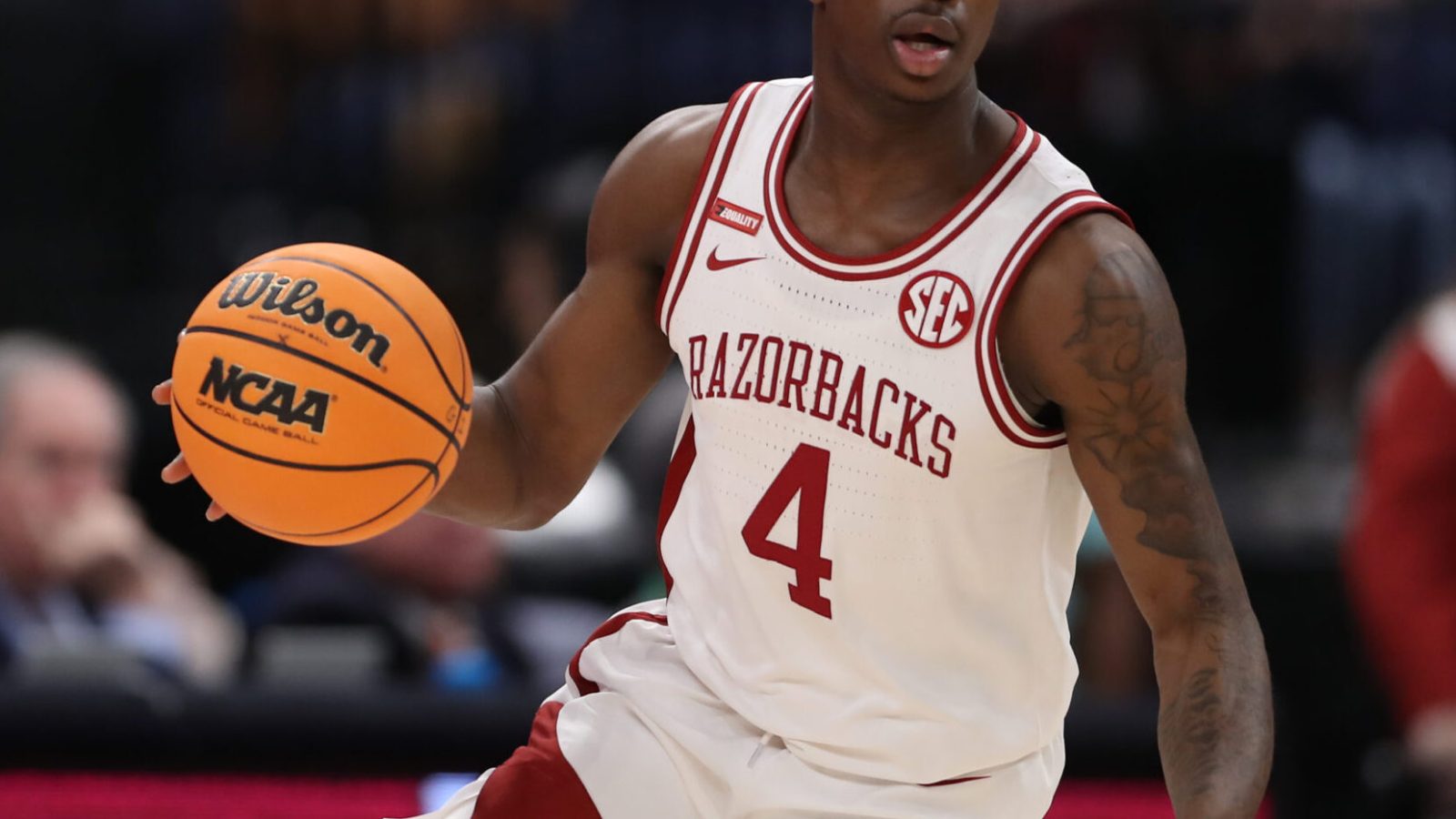 Arkansas Razorbacks guard Davonte Davis (4) leads a fast break for the Razorbacks during the SEC Tournament between the Texas A&M Aggies and the Arkansas Razorbacks on Thursday, March 11, 2022
