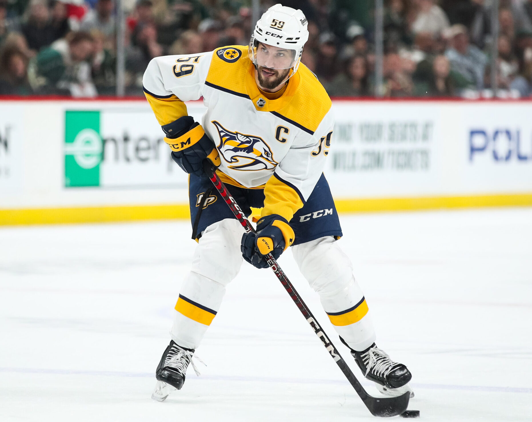 Roman Josi #59 of the Nashville Predators skates with the puck against the Minnesota Wild in the first period of the game at Xcel Energy Center
