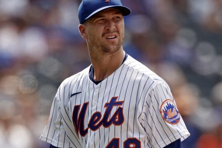 Jacob deGrom #48 of the New York Mets reacts walking to the dugout in the fifth inning against the Milwaukee Brewers during game one of a doubleheader at Citi Field on July 7, 2021 in the Flushing neighborhood of the Queens borough of New York City. The Mets won 4-3.