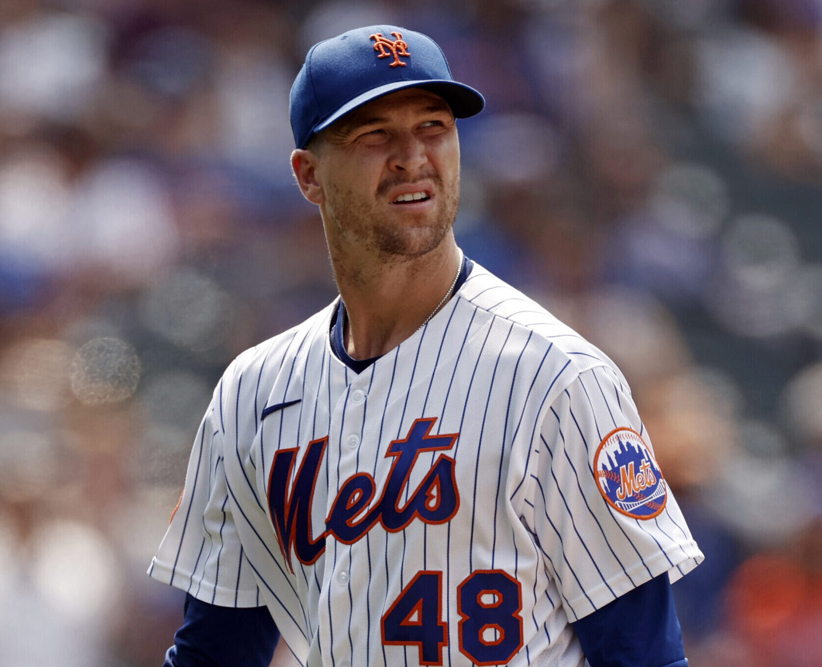 Jacob deGrom #48 of the New York Mets reacts walking to the dugout in the fifth inning against the Milwaukee Brewers during game one of a doubleheader at Citi Field on July 7, 2021 in the Flushing neighborhood of the Queens borough of New York City. The Mets won 4-3.