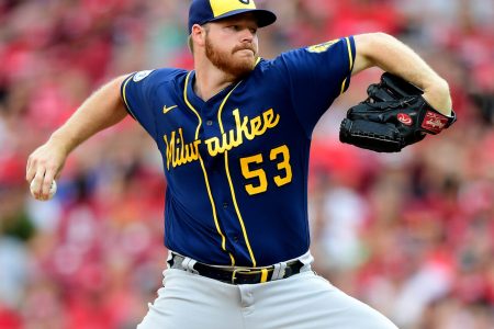 Brandon Woodruff #53 of the Milwaukee Brewers pitches during a game between the Cincinnati Reds and Milwaukee Brewers at Great American Ball Park on July 17, 2021 in Cincinnati, Ohio.