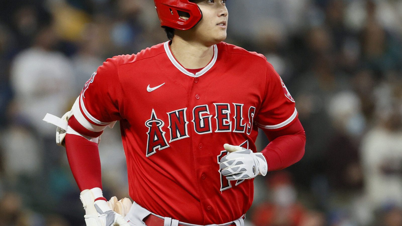 Shohei Ohtani #17 of the Los Angeles Angels watches his home run against the Seattle Mariners during the first inning at T-Mobile Park on October 03, 2021