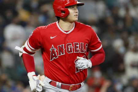 Shohei Ohtani #17 of the Los Angeles Angels watches his home run against the Seattle Mariners during the first inning at T-Mobile Park on October 03, 2021