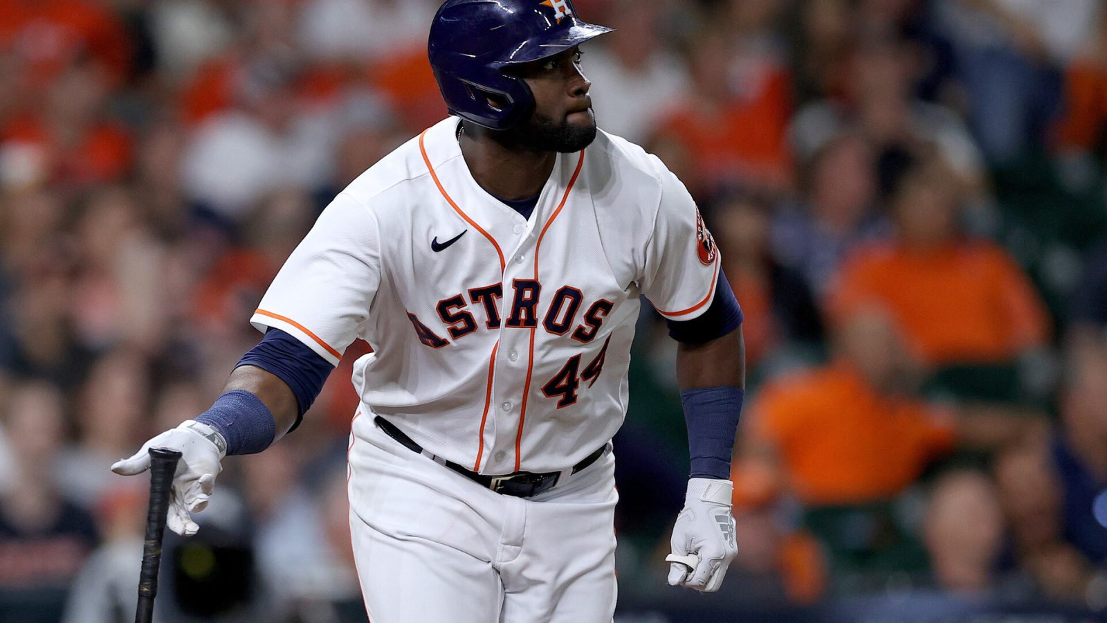 Yordan Alvarez #44 of the Houston Astros hits a triple against the Atlanta Braves during the eighth inning in Game One of the World Series at Minute Maid Park on October 26, 2021 in Houston, Texas.