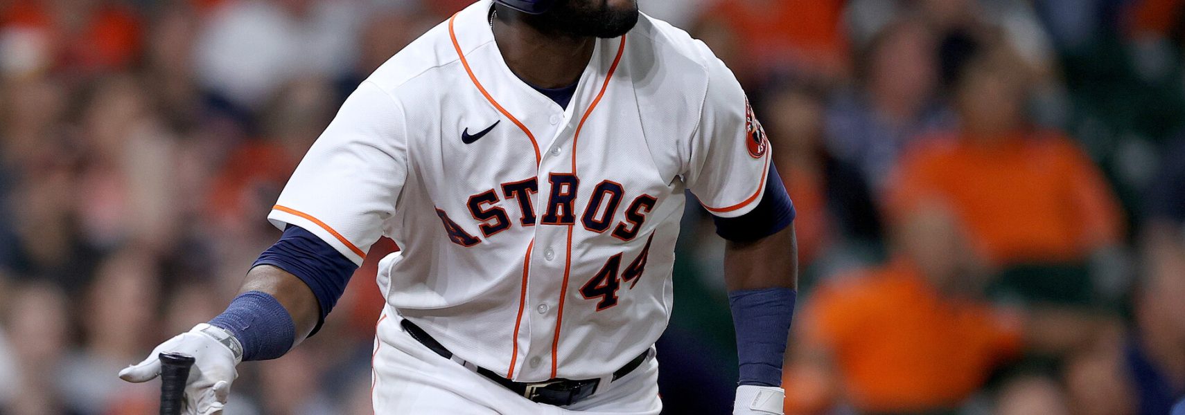 Yordan Alvarez #44 of the Houston Astros hits a triple against the Atlanta Braves during the eighth inning in Game One of the World Series at Minute Maid Park on October 26, 2021 in Houston, Texas.
