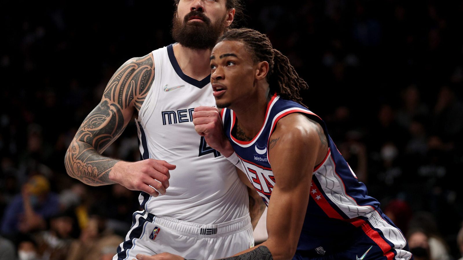 Steven Adams #4 of the Memphis Grizzlies and Nic Claxton #33 of the Brooklyn Nets fight for position during a free throw in the first half at Barclays Center on January 03, 2022 in the Brooklyn borough of New York City.