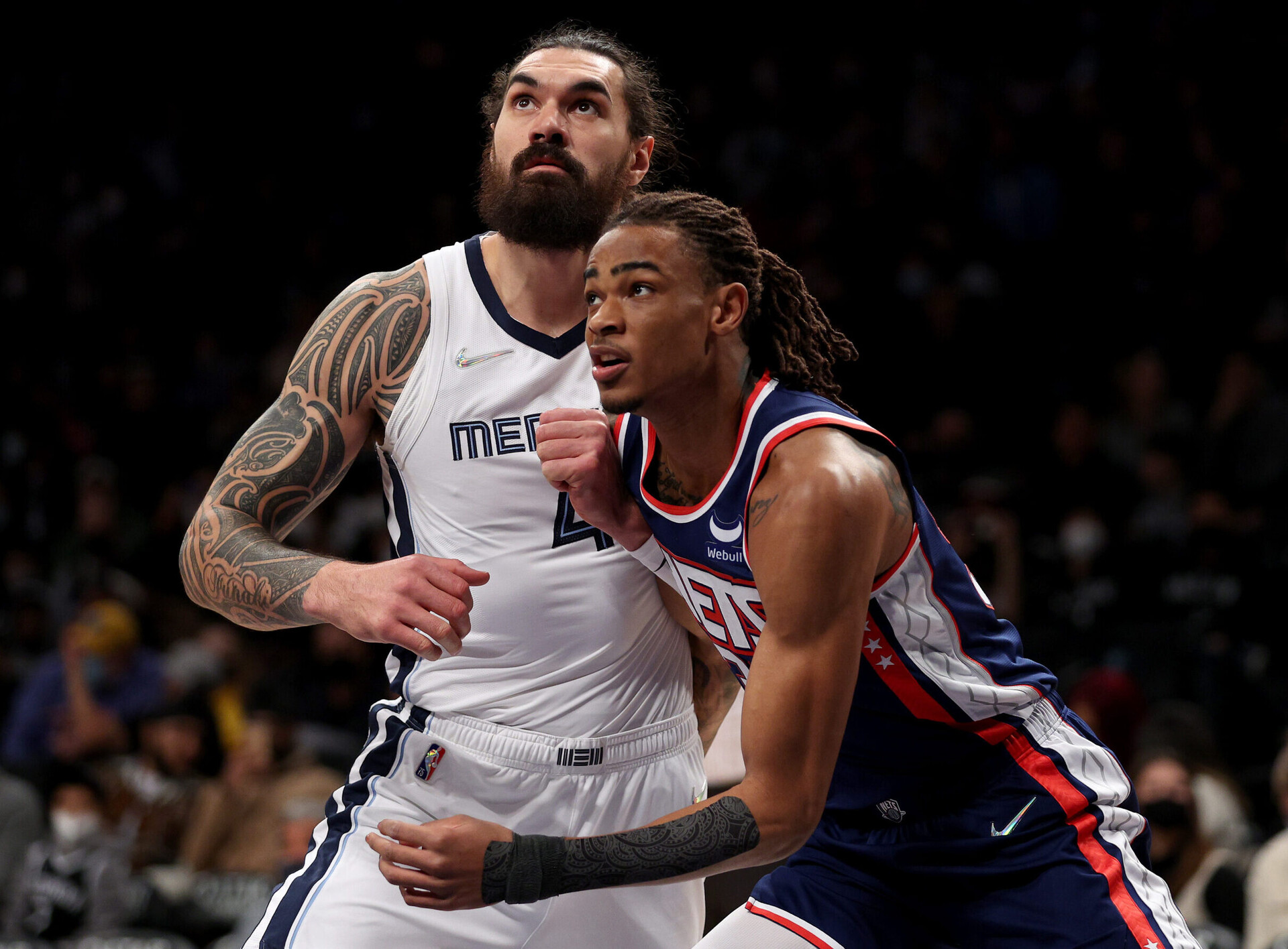 Steven Adams #4 of the Memphis Grizzlies and Nic Claxton #33 of the Brooklyn Nets fight for position during a free throw in the first half at Barclays Center on January 03, 2022 in the Brooklyn borough of New York City.