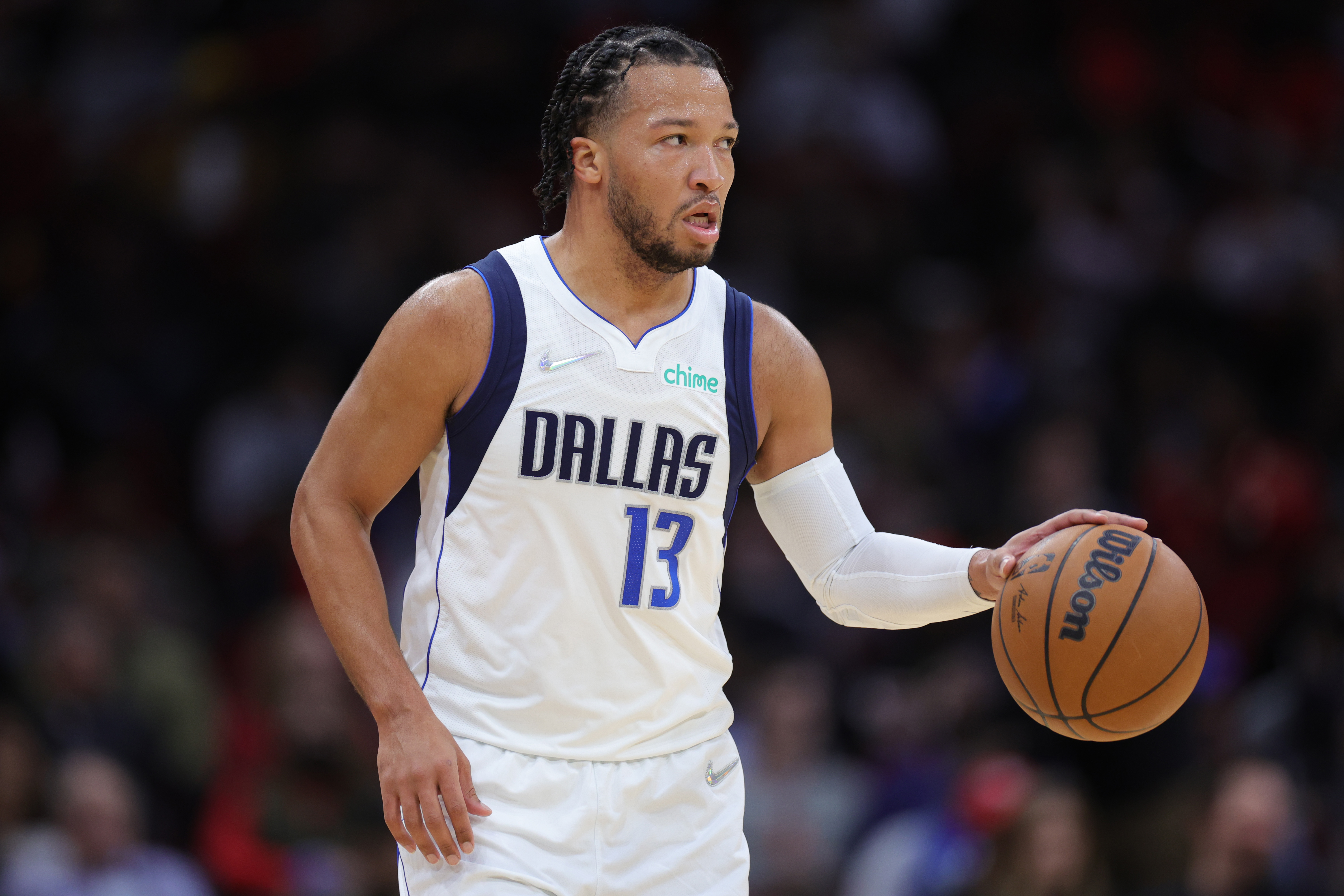 Jalen Brunson #13 of the Dallas Mavericks controls the ball during the second half against the Houston Rockets at Toyota Center on January 07, 2022 in Houston, Texas.