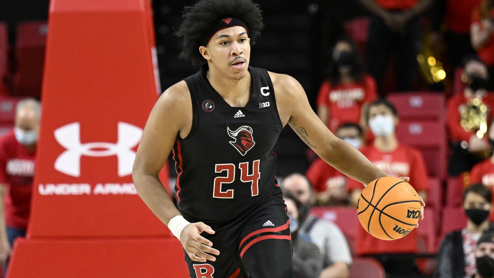 Ron Harper Jr. #24 of the Rutgers Scarlet Knights handles the ball against the Maryland Terrapins at Xfinity Center on January 15, 2022 in College Park, Maryland.