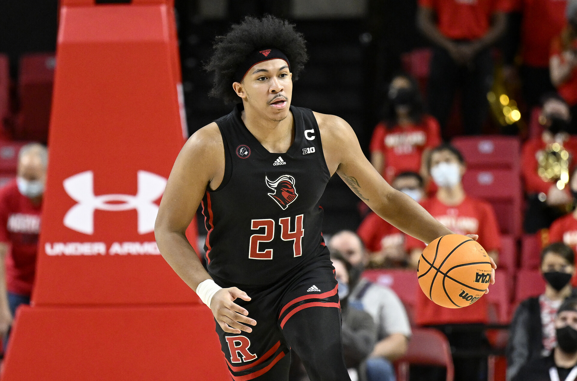 Ron Harper Jr. #24 of the Rutgers Scarlet Knights handles the ball against the Maryland Terrapins at Xfinity Center on January 15, 2022 in College Park, Maryland.