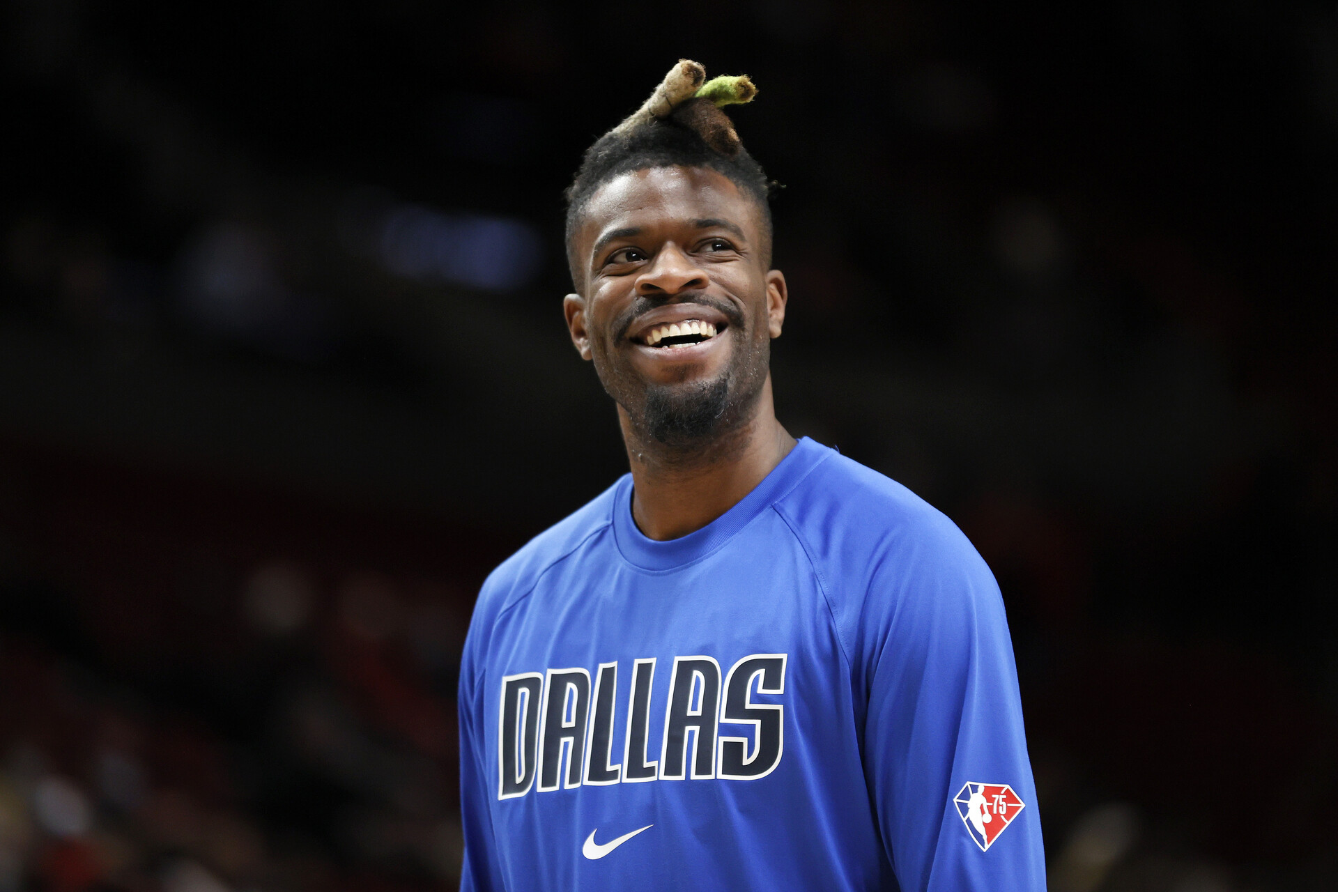 Reggie Bullock #25 of the Dallas Mavericks looks on before the game against the Portland Trail Blazers at Moda Center on January 26, 2022 in Portland, Oregon. NOTE TO USER: User expressly acknowledges and agrees that, by downloading and/or using this photograph, User is consenting to the terms and conditions of the Getty Images License Agreement.