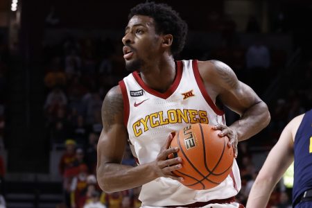 Izaiah Brockington #1 of the Iowa State Cyclones passes the ball in the first half of play at Hilton Coliseum on February 23, 2022 in Ames, Iowa. The Iowa State Cyclones won 84-81 over the West Virginia Mountaineers.