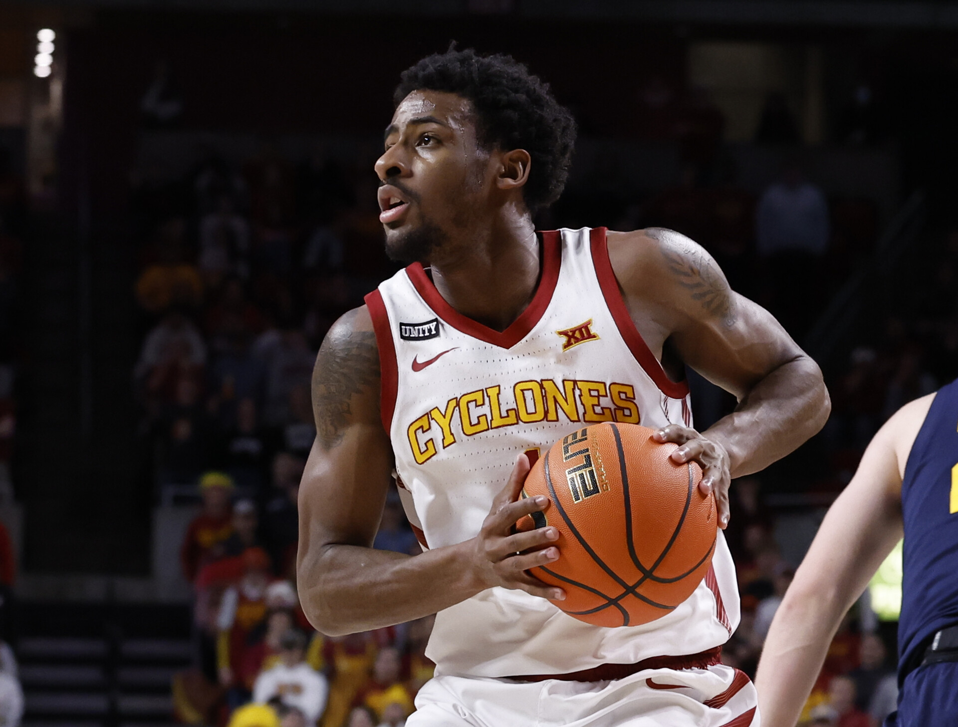 Izaiah Brockington #1 of the Iowa State Cyclones passes the ball in the first half of play at Hilton Coliseum on February 23, 2022 in Ames, Iowa. The Iowa State Cyclones won 84-81 over the West Virginia Mountaineers.