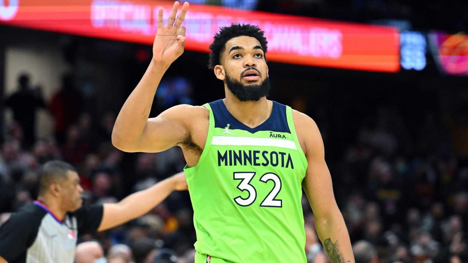 Karl-Anthony Towns #32 of the Minnesota Timberwolves celebrates after scoring during the fourth quarter against the Cleveland Cavaliers at Rocket Mortgage Fieldhouse on February 28, 2022 in Cleveland, Ohio. The Timberwolves defeated the Cavaliers 127-122.