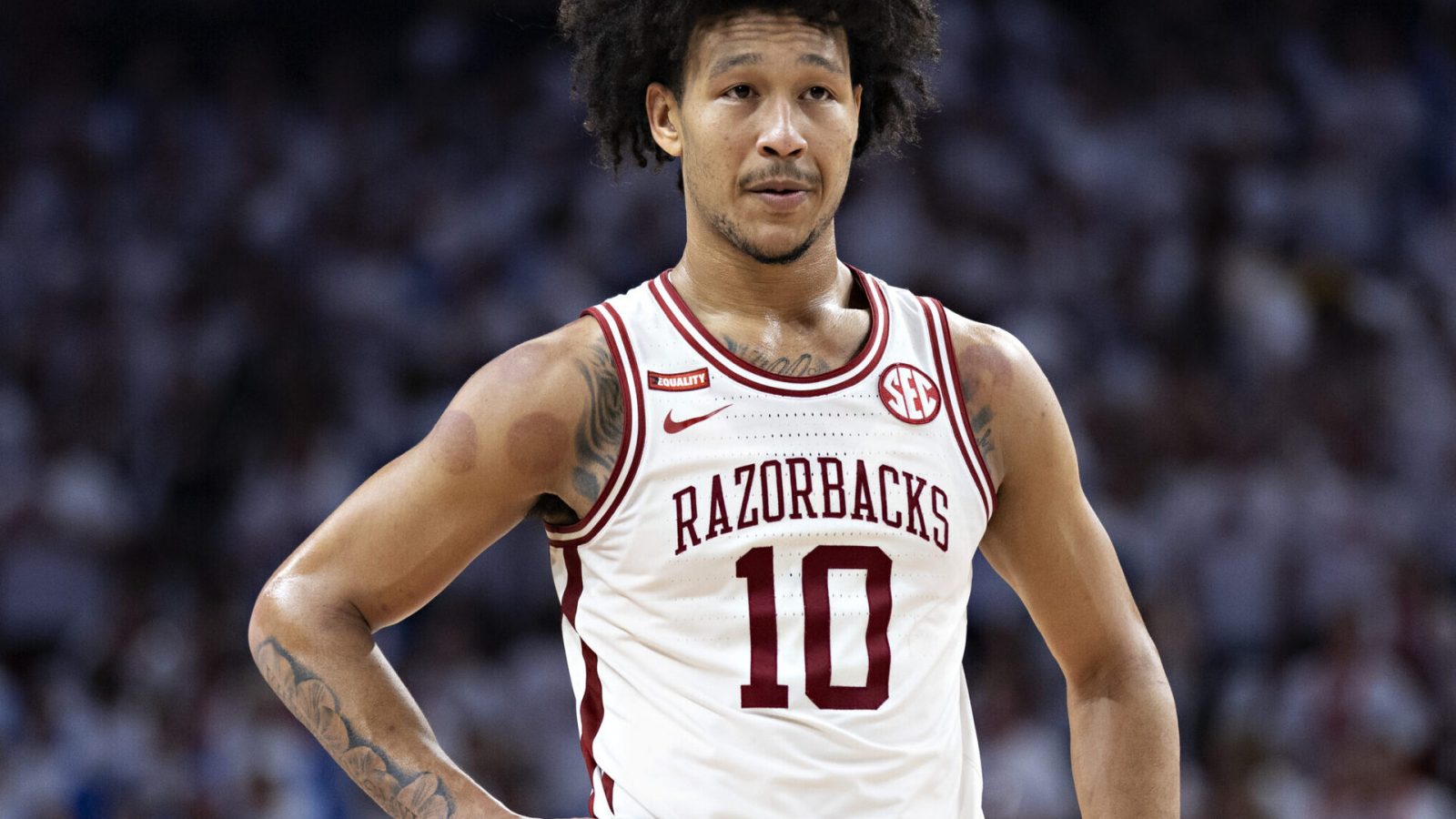 Jaylin Williams #10 of the Arkansas Razorbacks on the court during a game against the Kentucky Wildcats at Bud Walton Arena on February 26, 2022 in Fayetteville, Arkansas. The Razorbacks defeated the Wildcats 75-73.