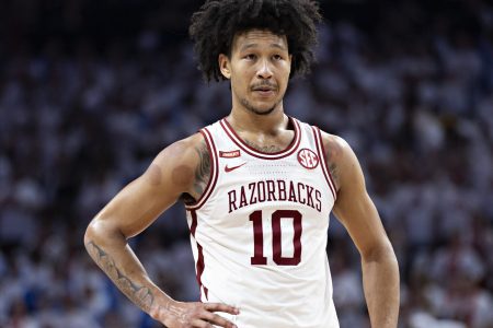 Jaylin Williams #10 of the Arkansas Razorbacks on the court during a game against the Kentucky Wildcats at Bud Walton Arena on February 26, 2022 in Fayetteville, Arkansas. The Razorbacks defeated the Wildcats 75-73.