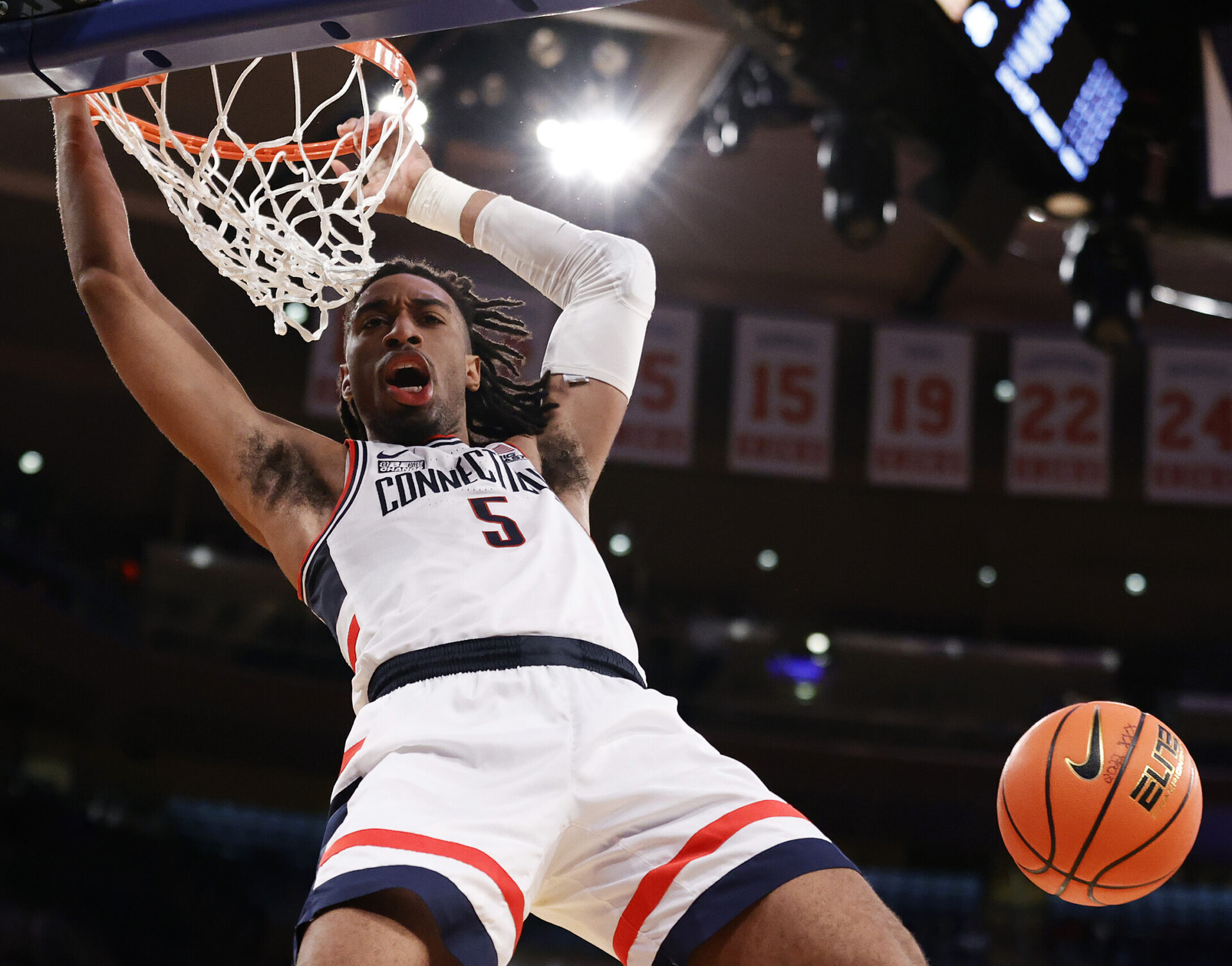 Isaiah Whaley #5 of the Connecticut Huskies dunks the ball in the second half of the game against the Seton Hall Pirates during the 2022 Big East Tournament at Madison Square Garden on March 10, 2022 in New York City