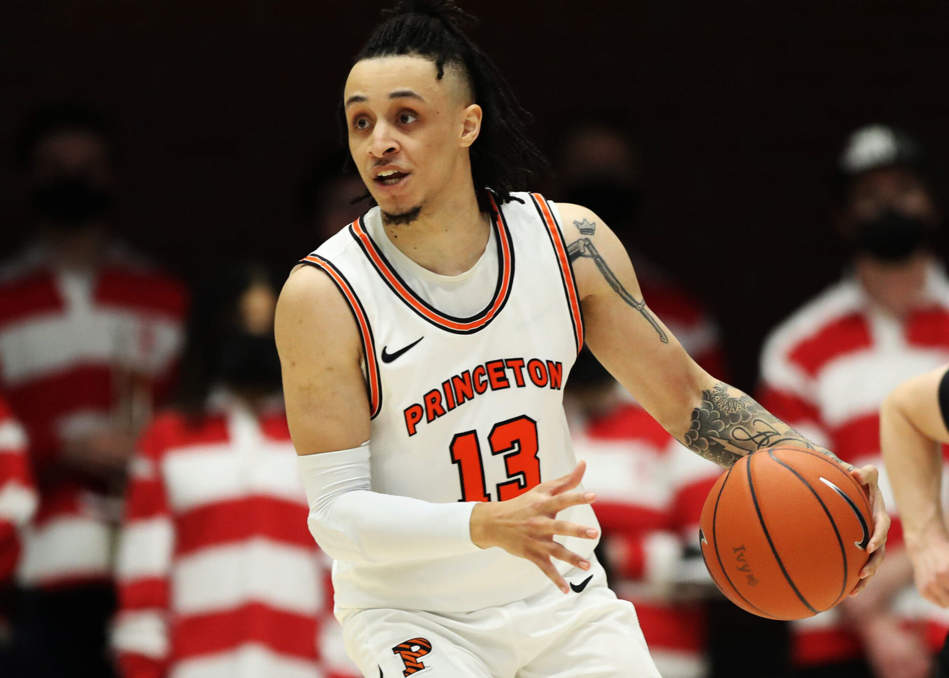 Princeton Tigers guard Jaelin Llewellyn dribbles the ball with his left hand during the Ivy League basketball tournament semifinals