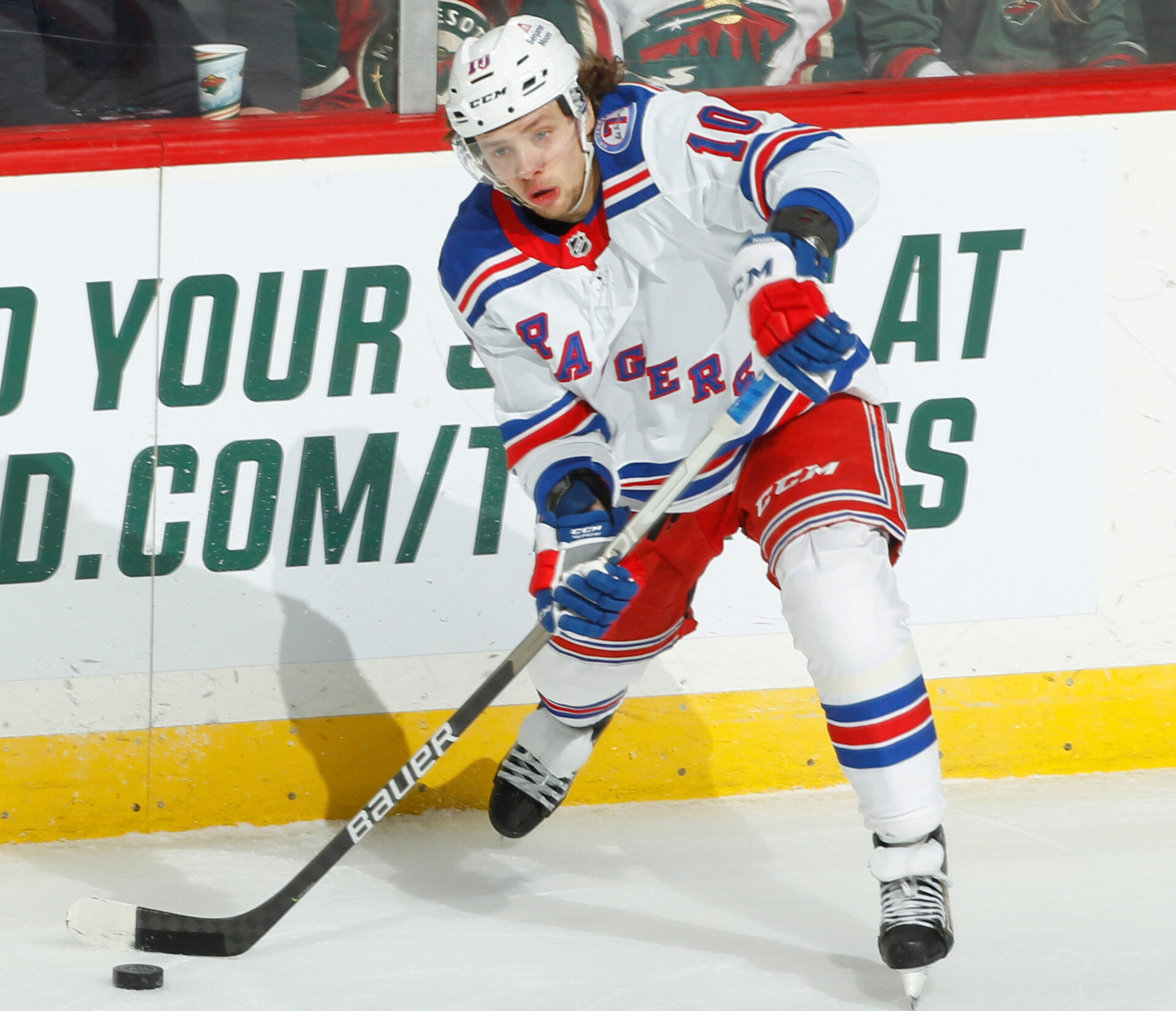 Artemi Panarin #10 of the New York Rangers passes the puck against the Minnesota Wild during the game at the Xcel Energy Center on March 8, 2022 in Saint Paul, Minnesota