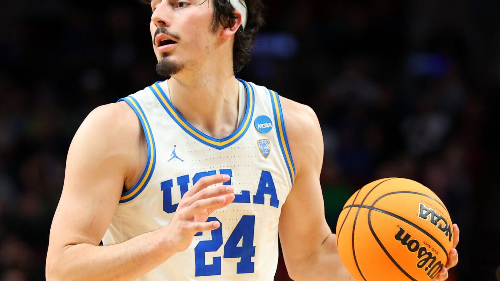 Jaime Jaquez Jr. #24 of the UCLA Bruins controls the ball against the Akron Zips in the first round game of the 2022 NCAA Men's Basketball Tournament at Moda Center on March 17, 2022 in Portland, Oregon