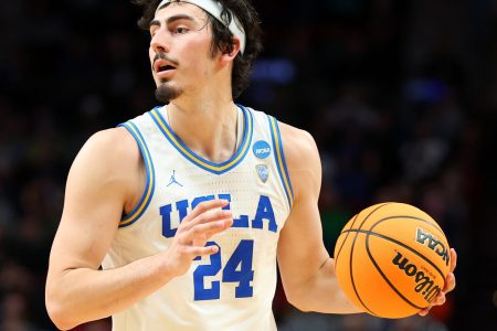 Jaime Jaquez Jr. #24 of the UCLA Bruins controls the ball against the Akron Zips in the first round game of the 2022 NCAA Men's Basketball Tournament at Moda Center on March 17, 2022 in Portland, Oregon