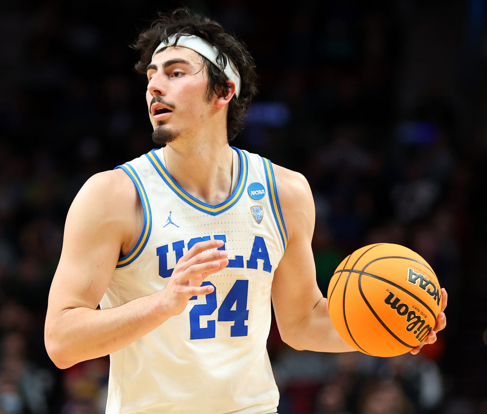 Jaime Jaquez Jr. #24 of the UCLA Bruins controls the ball against the Akron Zips in the first round game of the 2022 NCAA Men's Basketball Tournament at Moda Center on March 17, 2022 in Portland, Oregon