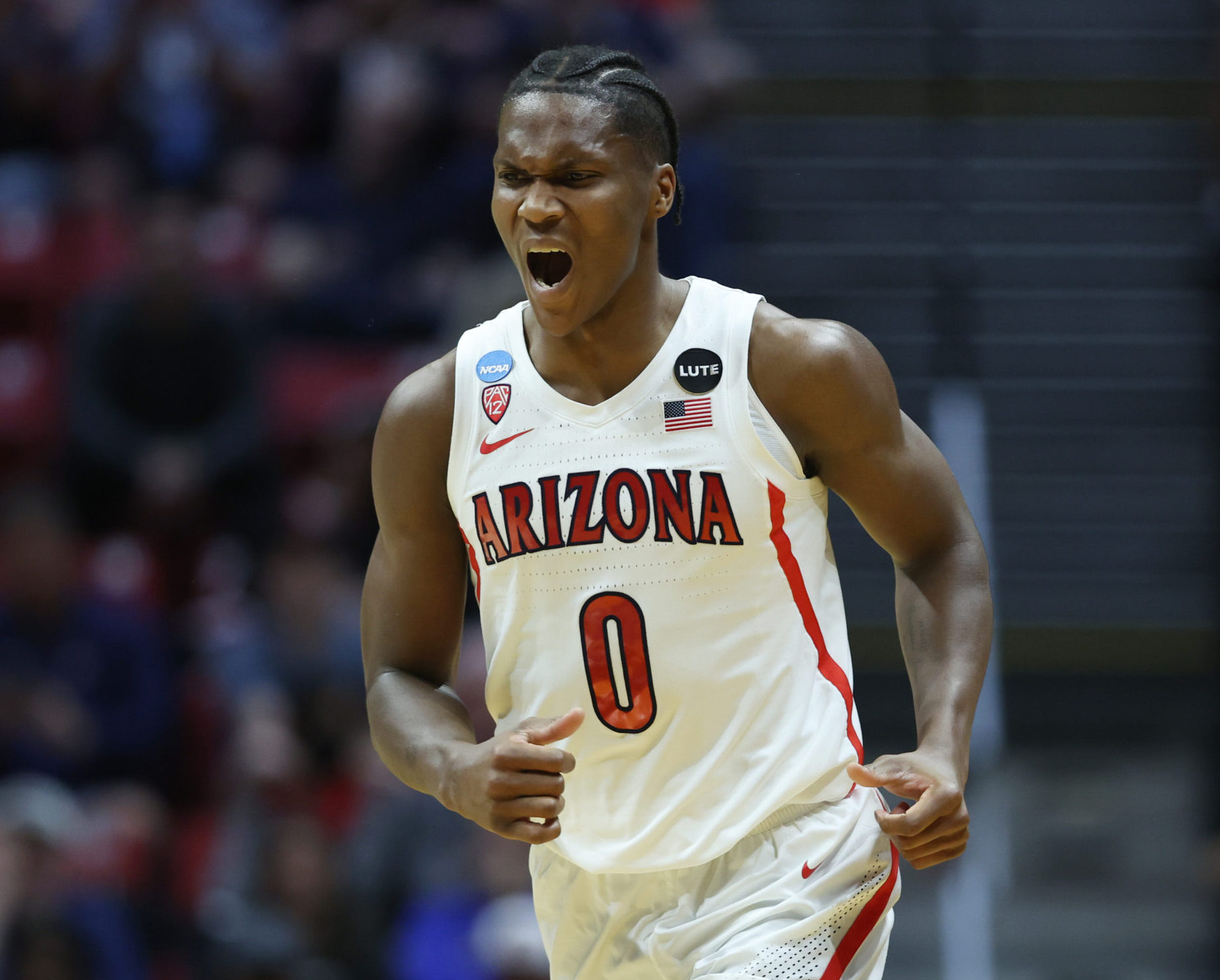 Bennedict Mathurin #0 of the Arizona Wildcats after his made three point basket against the Wright State Raiders during the first half in the first round game of the 2022 NCAA Men's Basketball Tournament