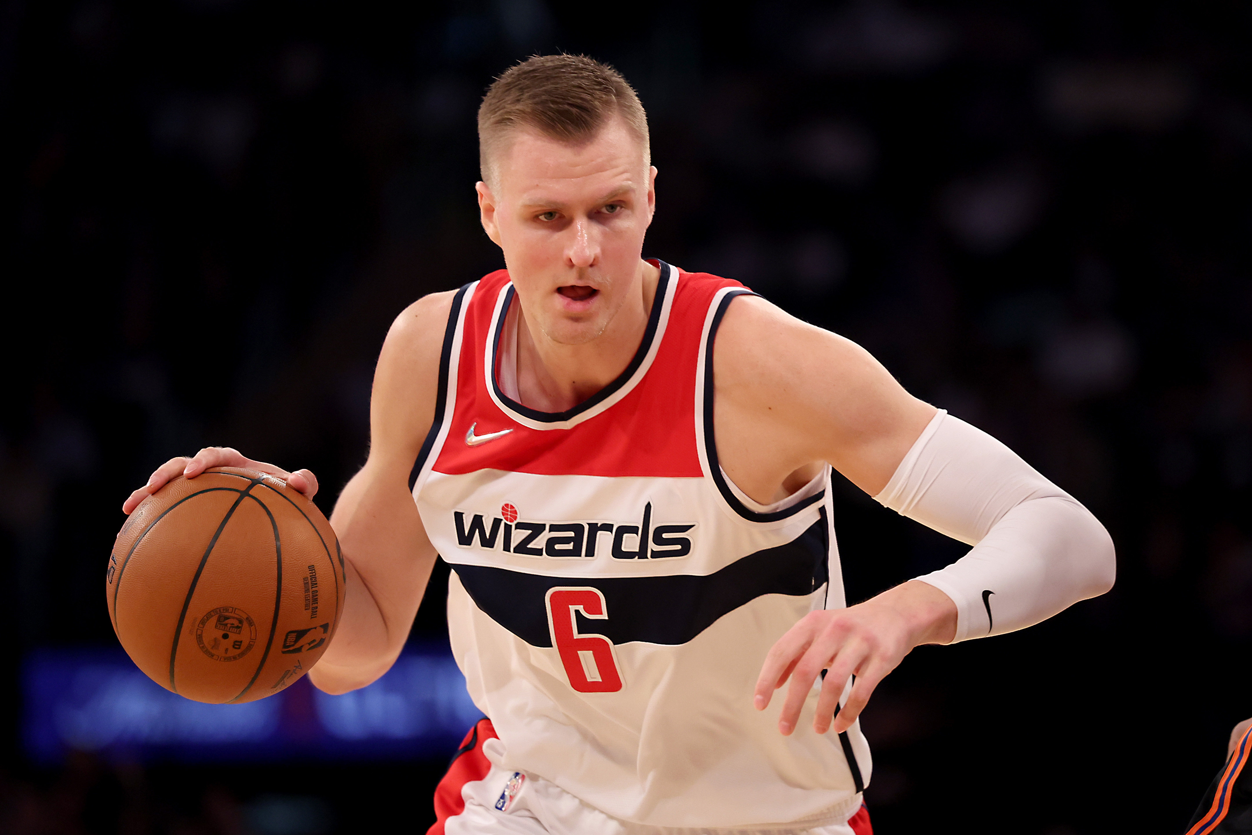 Kristaps Porzingis #6 of the Washington Wizards dribbles the ball during the second quarter of the game against the New York Knicks at Madison Square Garden on March 18, 2022 in New York City.
