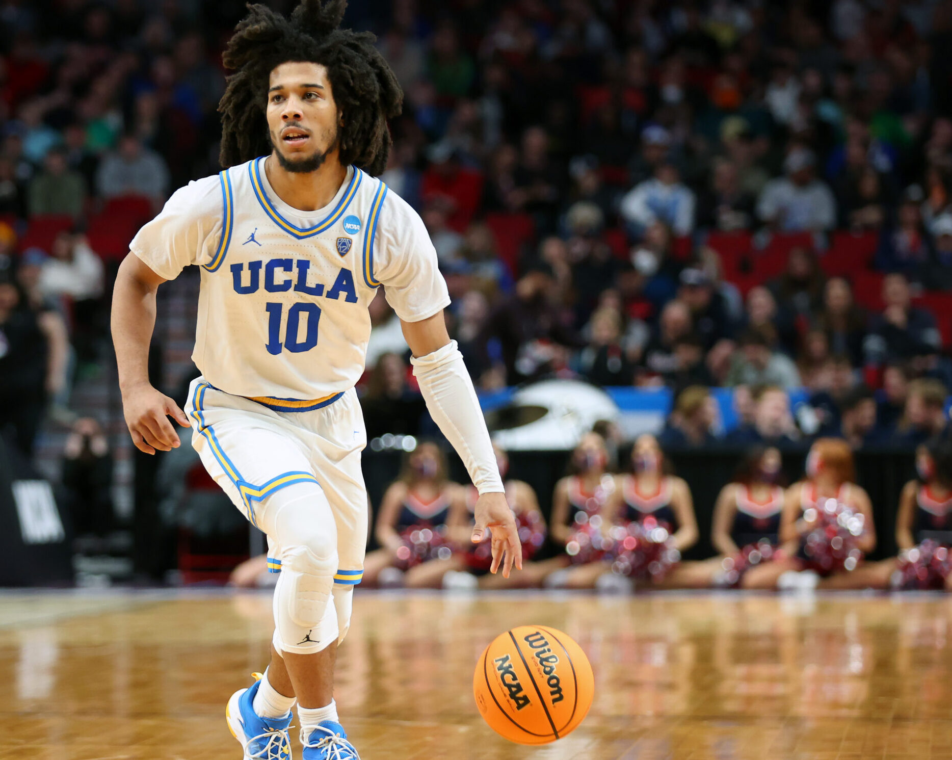 Tyger Campbell #10 of the UCLA Bruins dribbles the ball during the second half against the St. Mary's Gaels in the second round of the 2022 NCAA Men's Basketball Tournament at Moda Center on March 19, 2022 in Portland, Oregon.
