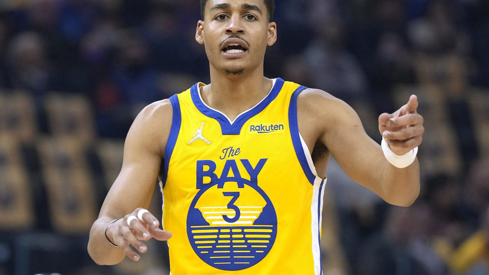 Jordan Poole #3 of the Golden State Warriors looks on against the San Antonio Spurs in the first half of an NBA basketball game at Chase Center on March 20, 2022 in San Francisco, California.