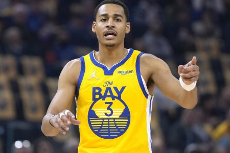 Jordan Poole #3 of the Golden State Warriors looks on against the San Antonio Spurs in the first half of an NBA basketball game at Chase Center on March 20, 2022 in San Francisco, California.