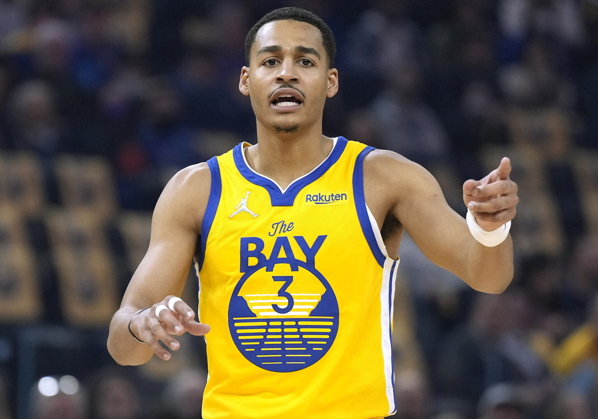 Jordan Poole #3 of the Golden State Warriors looks on against the San Antonio Spurs in the first half of an NBA basketball game at Chase Center on March 20, 2022 in San Francisco, California.