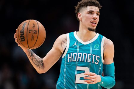 LaMelo Ball #2 of the Charlotte Hornets brings the ball up court against the New York Knicks during their game at Spectrum Center on March 23, 2022 in Charlotte, North Carolina.