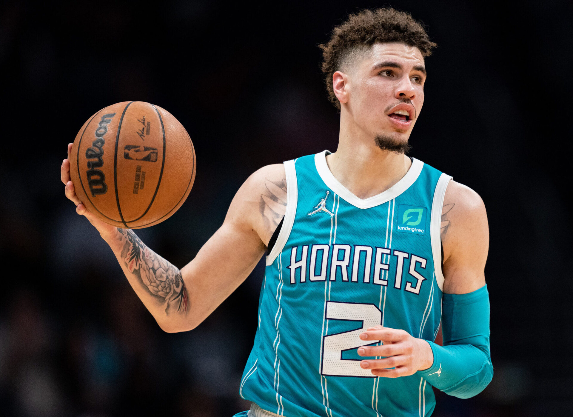 LaMelo Ball #2 of the Charlotte Hornets brings the ball up court against the New York Knicks during their game at Spectrum Center on March 23, 2022 in Charlotte, North Carolina.