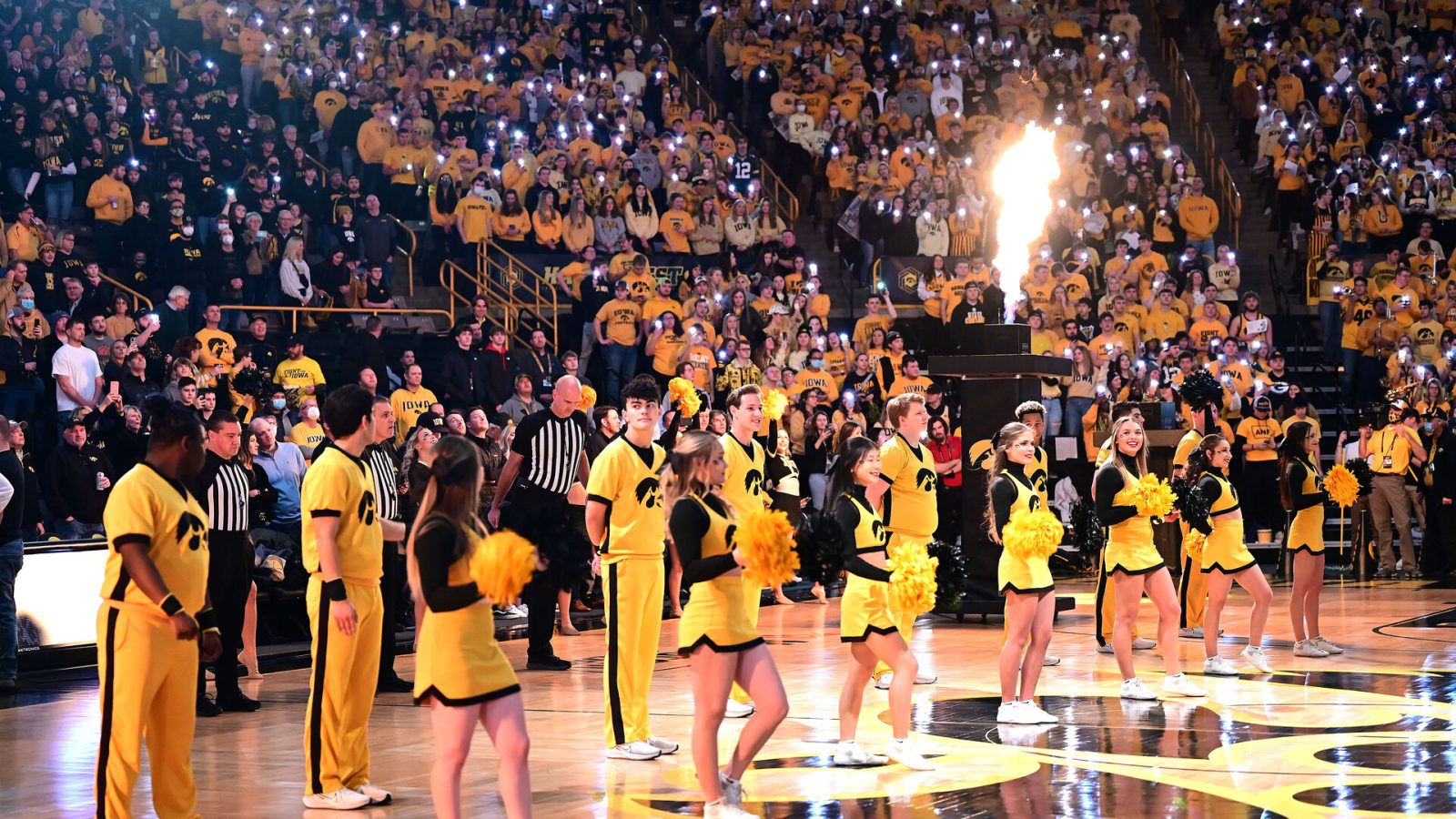 Fans and cheerleader wait on the player introductions before a college basketball game between the Penn State Nittany Lions and the Iowa Hawkeyes on January 22, 2022, at Carver-Hawkeye Arena, Iowa City, IA.